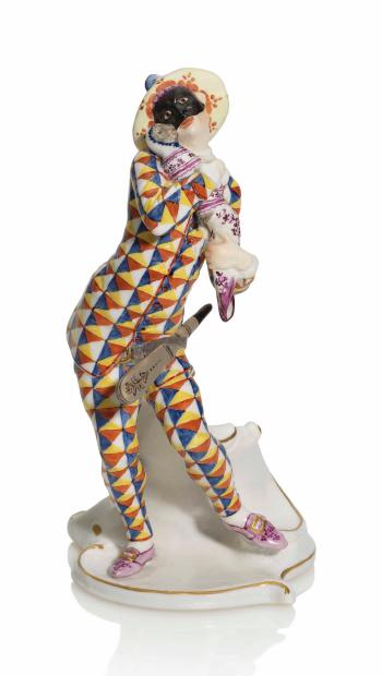 A Nymphenburg Porcelain Commedia Dell'arte Figure of Mezzetino as Harlequin by 
																	 Nymphenburg
