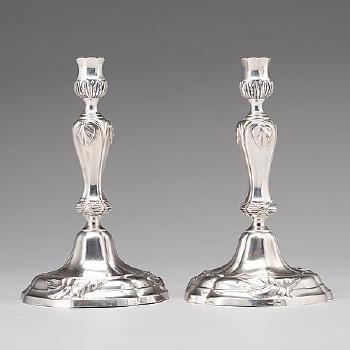 A Pair Of 18th Century Silver Candlesticks by 
																			Swante Striedbeck