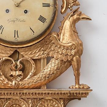A Swedish Empire Wall Clock by 
																			G Unden