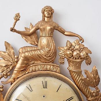 A Swedish Empire Wall Clock by 
																			G Unden