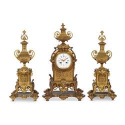 A Napoleon III Renaissance Revival Clock Garniture by 
																	 Vauquelin
