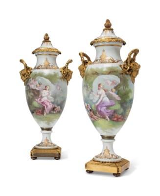 A Pair of Ormolu-Mounted Sevres Style Porcelain Vases and Covers by 
																	Albert Louis Dapoigny