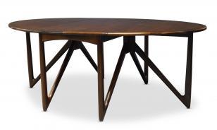 A Rosewood Drop Leaf Dining Table  by 
																	 Jason Mobler