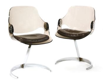 A pair of perspex and chrome chairs by 
																	Boris Tabakoff