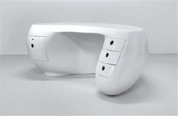 A Boomerang desk designed by Maurice Calka c. 1970 by 
																			Maurice Calka