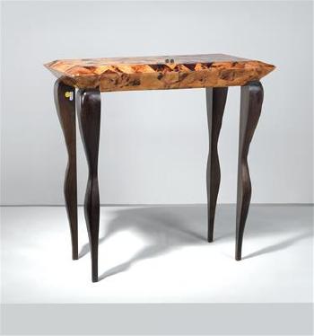 A small table featuring a hinged top Ria & Yiouri Augousti, France, c. 1995 by 
																			Ria & Yiouri Augousti