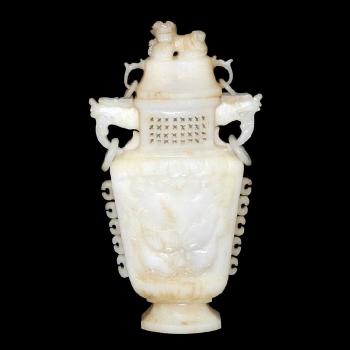 A White Jade Flask with Taotie Masks by 
																			 Han Dynasty