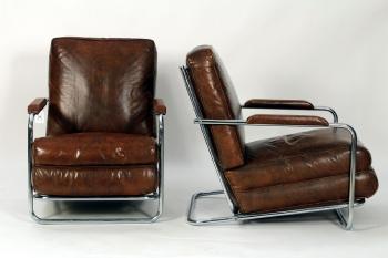 Art Deco pair of armchairs in chrome and leather by 
																			 Art Deco School