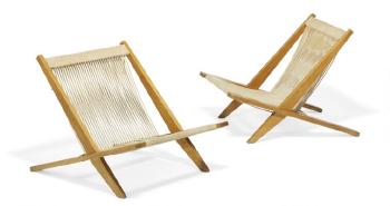 A pair of easy chairs with patinated ash wood frame by 
																	Jorgen Hoj