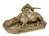 A Russian gilt bronze sculpture with a shooting soldier using his horse as a shelter by 
																			Vasily Yakovlevich