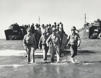 Gen. Douglas MacArthur landing in Luzon, Philippines by 
																	Carl Mydans