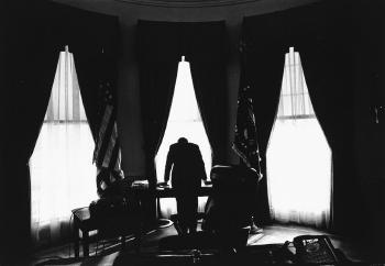John F. Kennedy in the Oval Office (The Loneliest Job in the World) by 
																	George Tames