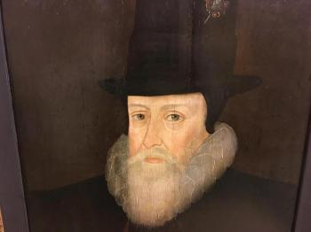 Portrait of William Cecil, 1st Baron Burghley, KG, PC (1520-1598), half length, in black, with a cameo brooch of Queen Elizabeth in a gemset frame on his hat, holding the White Rod of the Lord High Treasurer and wearing the Garter Ribbon by 
																			 Anglo-Flemish School
