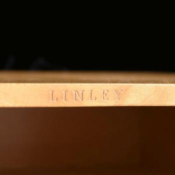 A four piece marquetry inlaid maple and mahogany desk set by 
																			David Linley