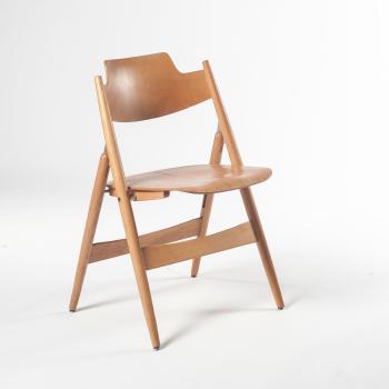 Six SE 18 folding chairs by 
																			Egon Eiermann