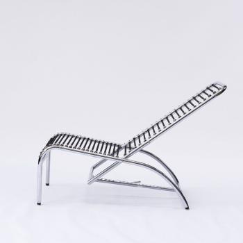 107 long chair by 
																			Rene Herbst