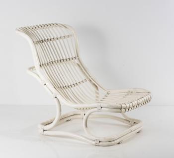 Punto e Virgola wicker chair by 
																			 Pierantonio Bonacina