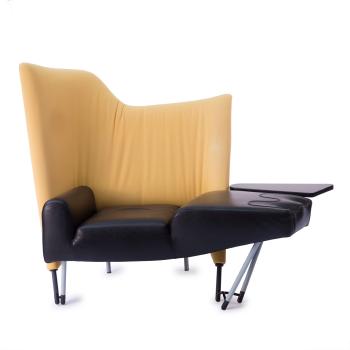 Torso lounge chair with ottoman by 
																			Paolo Deganello