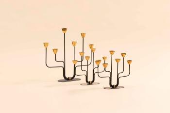 Suite de trois chandeliers by 
																	 Ystad-Metall