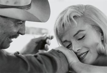 Marilyn Monroe and Clark Gable during the filming of 'The Misfits', Nevada by 
																	Cornell Capa