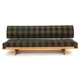 Oak daybed mounted on runner legs, frame with partly raised edge by 
																			P Jeppesen