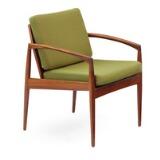 A rosewood armchair, loose cushions in seat and back upholstered with green wool by 
																			 Magnus Olsen