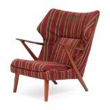 A teak easy chair by 
																			Kurt Olsen