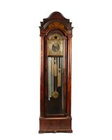A mahogany tall case musical clock by 
																	 Waltham Watch Company