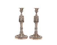 A pair of silver Faberge candlesticks by 
																	Julius Rappoport