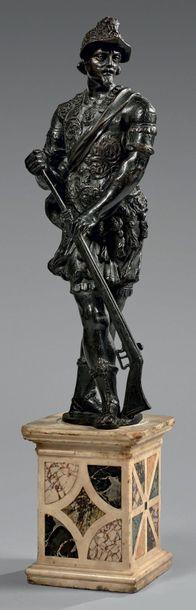 Arquebusier en armure chargeant son fusil by 
																			Tiziano Aspetti