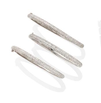 A Set Of 3 Diamond And Platinum Bangles by 
																	 Elan Jewelry