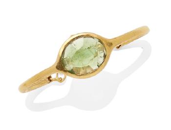 A Green Tourmaline And 22K Gold Cuff Bangle by 
																	 Evolve Jewelry