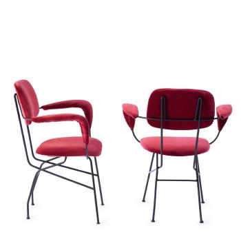 Two Cocorita T armchairs by 
																			 Velca Legnano