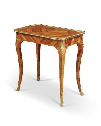 A Louis Xv Ormolu-mounted Bois Satine, Kingwood, Amaranth and Mahogany Marquetry Table a Ecrire by 
																	Roger Vandercruse