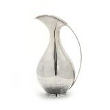 Sterling silver pitcher by 
																			Kay Otto Fisker