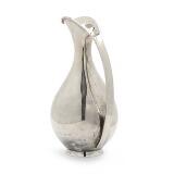 Sterling silver pitcher by 
																			Kay Otto Fisker