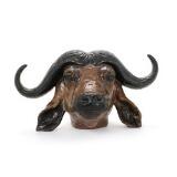 African buffalo head of earthenware by 
																			Arne Ingdam