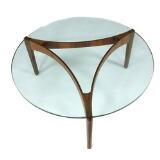 Circular coffee table with rosewood frame, top of glass by 
																			Sven Ellekjaer