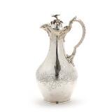 A English sterling silver wine pitcher by 
																			John Barnard
