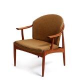 A teak armchair by 
																			C F Christensen