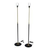 A pair of brass and blacklacquered metal telescope standard lamps by 
																			Aage Petersen
