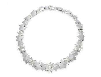 A Diamond and White Gold Necklace by 
																	 Fred