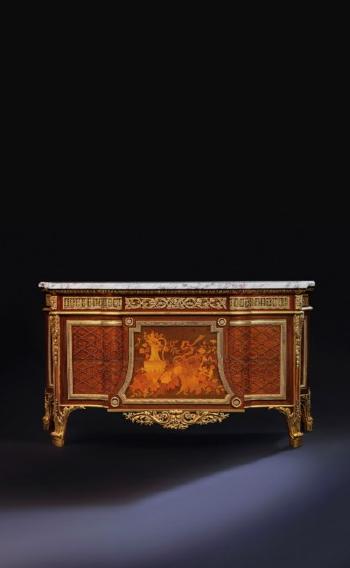 A French Ormolu-mounted Mahogany, Harewood, Bois Citronnier, and Burr Amboyna Marquetry and Parquetry Commode by 
																	Jean Henri Riesener