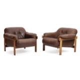 A Pair Of Stained Oak Easy Chairs by 
																			Percival Lafer