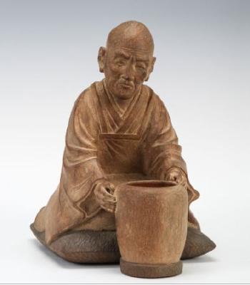 Wood Carved Greybeard Seated Statue by 
																	 Ise