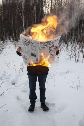 Burning News by 
																	Tim Parchikov