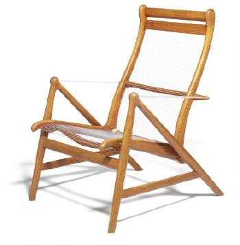 Sculptural easy chair with teak frame by 
																	Peder Pedersen