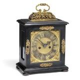 A James II ebony striking table clock by 
																			Edward Burgis