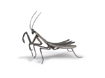 A silver articulated sculpture of a praying mantis by 
																	 Tanaka Tadayoshi