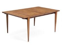 Rectangular rosewood dining table with two leaves by 
																			Henry Rosengren Hansen